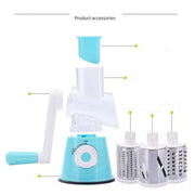 "Manual vegetable cutter with stainless steel blade in kitchen setup"