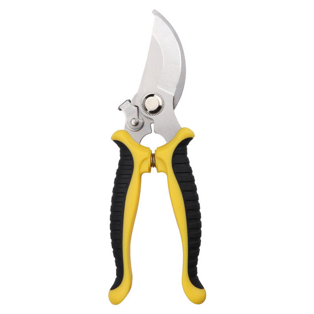 Durable steel gardening shears on wood surface