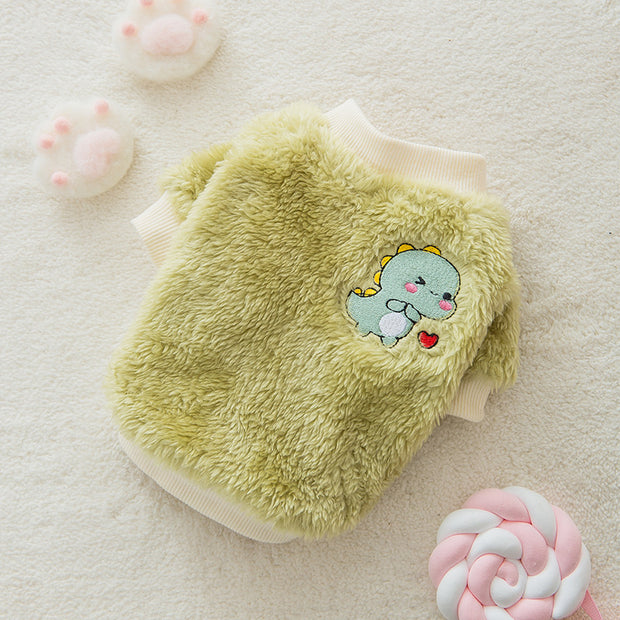 Small dog wearing warm winter teddy jacket