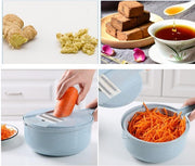 Slicer with grated carrots shwn in clear  container