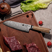 “Professional chef knife with wooden handle on cutting board”