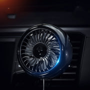 Black mini car AC fan on dashboard