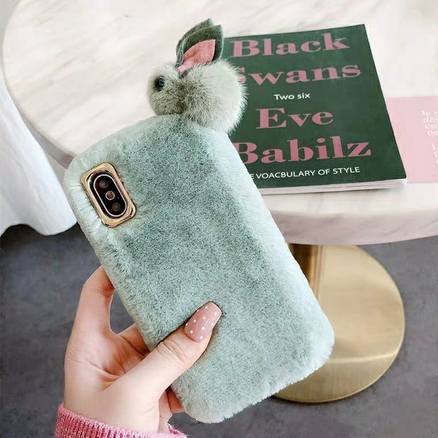 "Stylish protective iPhone case with soft fur for cold weather"