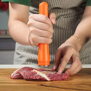 Using tool to tenderize raw meat
