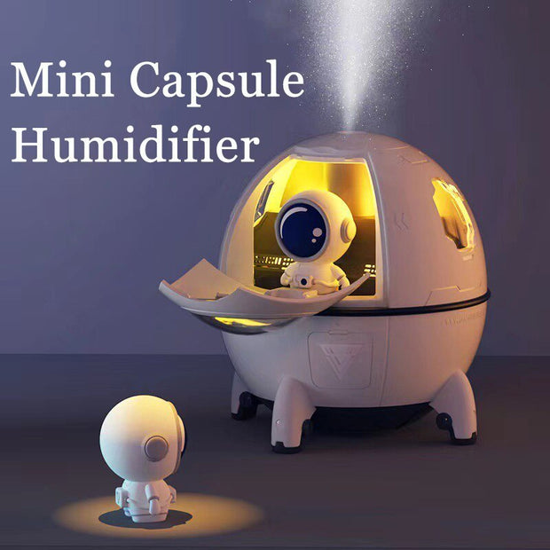Astronaut humidifier with LED light glowing purple