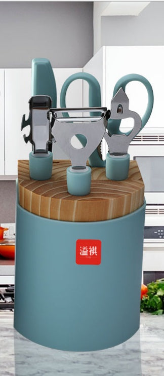 "Cooking essentials including whisk, peeler, grater