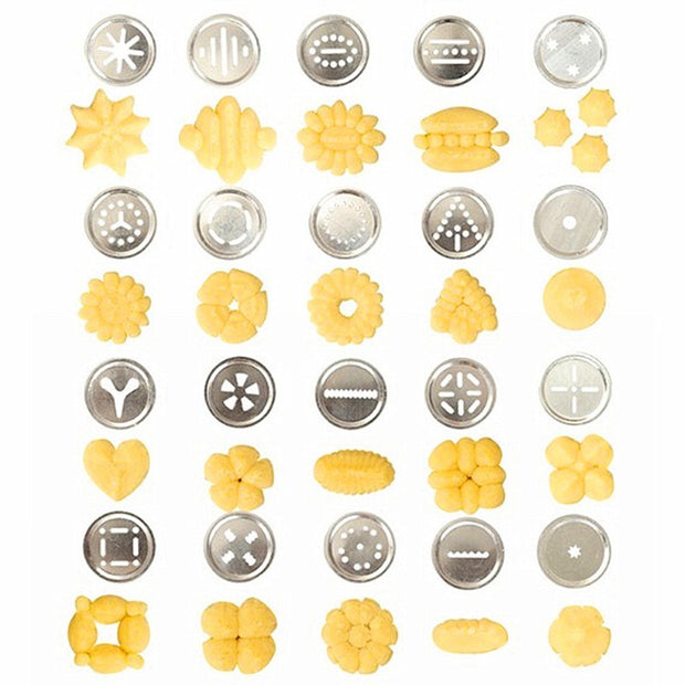 "Cookie gun in kitchen setup with baked goods"