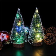 Small tabletop Christmas tree with LED decorations