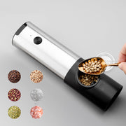 Electric pepper grinder dispensing black pepper