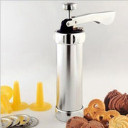 "Cookie decorating gun with nozzle tips and cookies