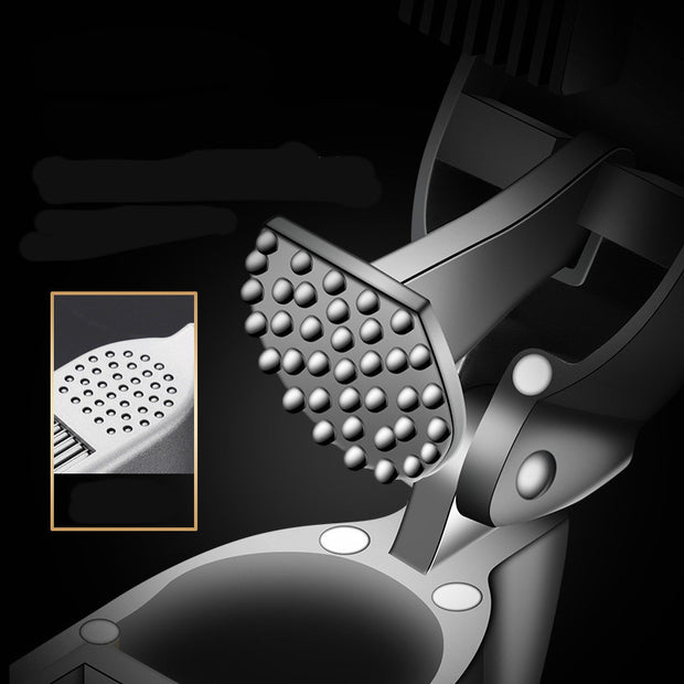 "Kitchen counter garlic pressing scene"