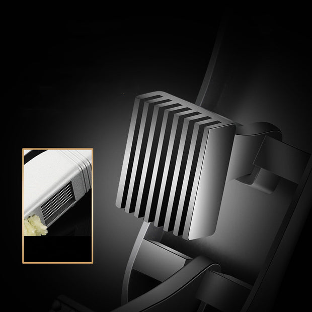 "Close-up of aluminum garlic press blades