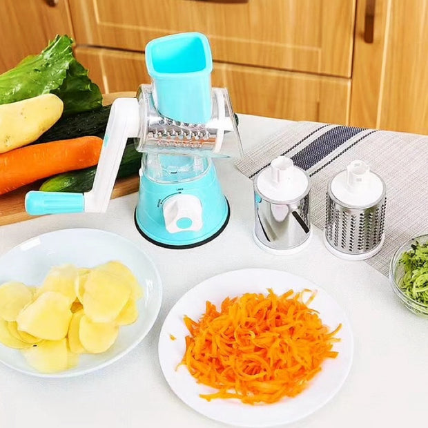 "Manual vegetable cutter with stainless steel blade in kitchen setup"