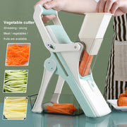 Multifunctional vegetable cutter slicing carrots and cucumbers